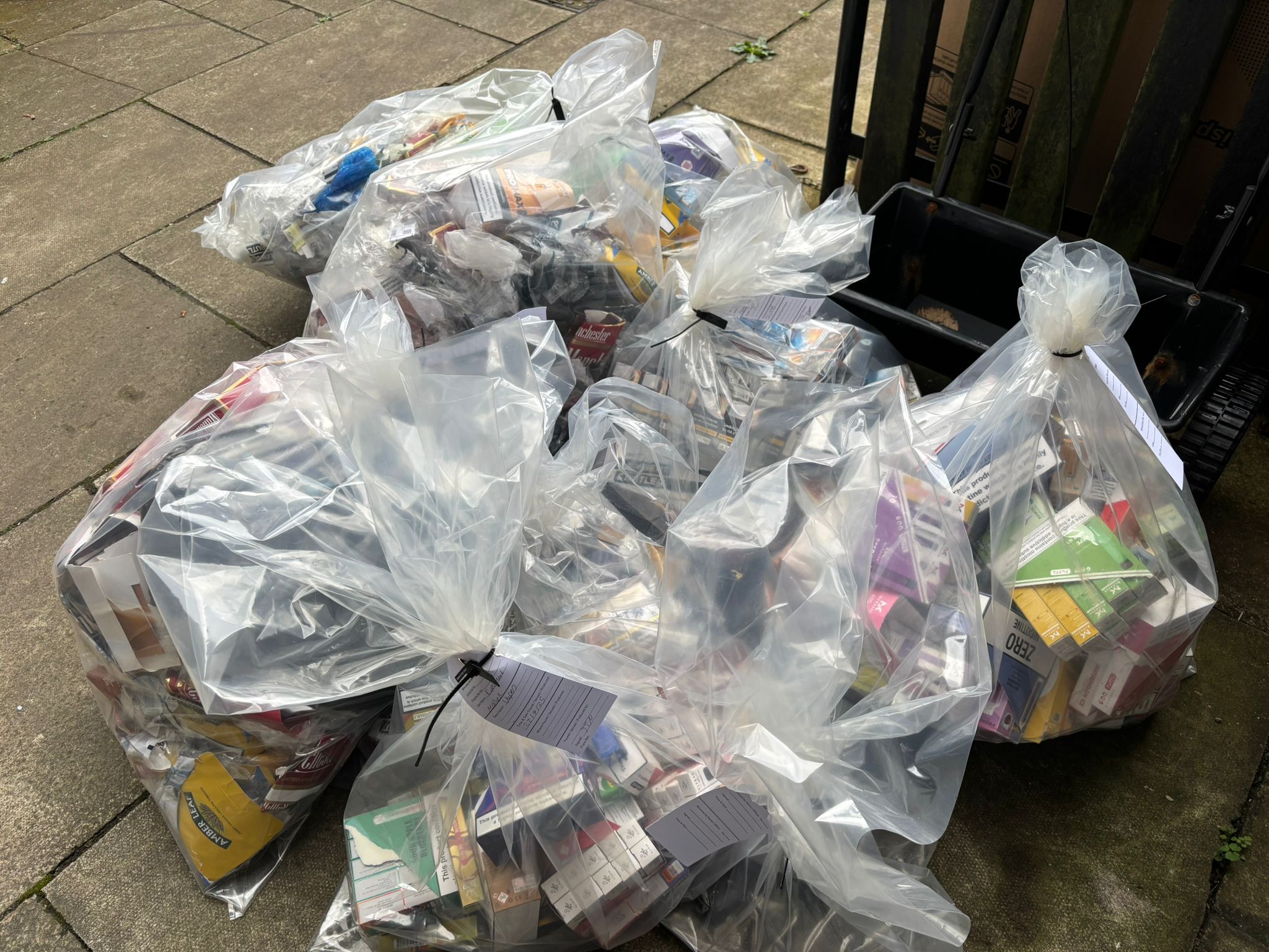 ags of seized illicit cigarettes, tobacco and illegal vapes from four retailer premises in Swinton, Walkden and Cadishead