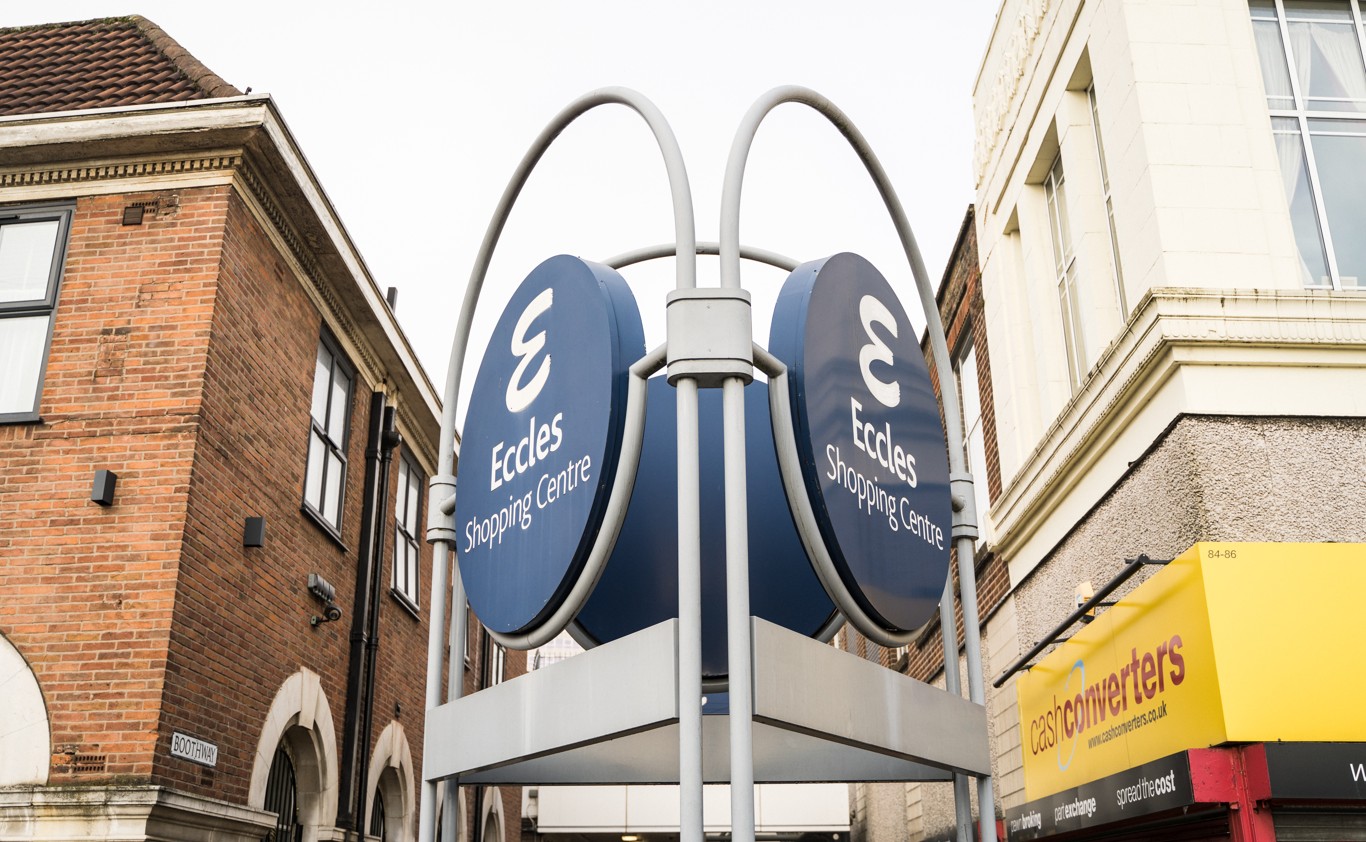 The Eccles Shopping Centre sign in Eccles town centre