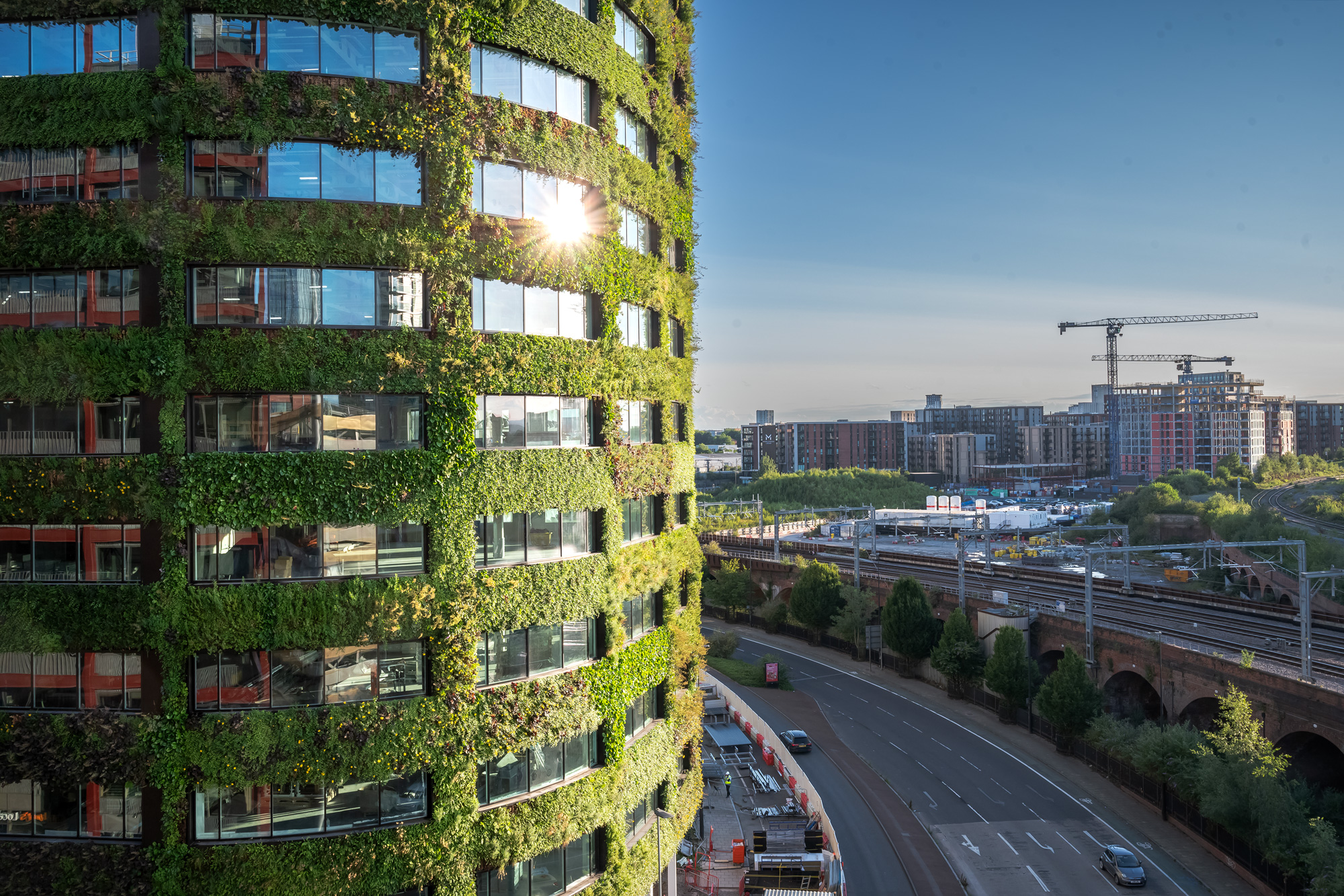 The Eden building in Salford covered in grass