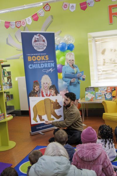 Simon Donn, Library Development Officer, leads a storytelling session with children from Little Hulton