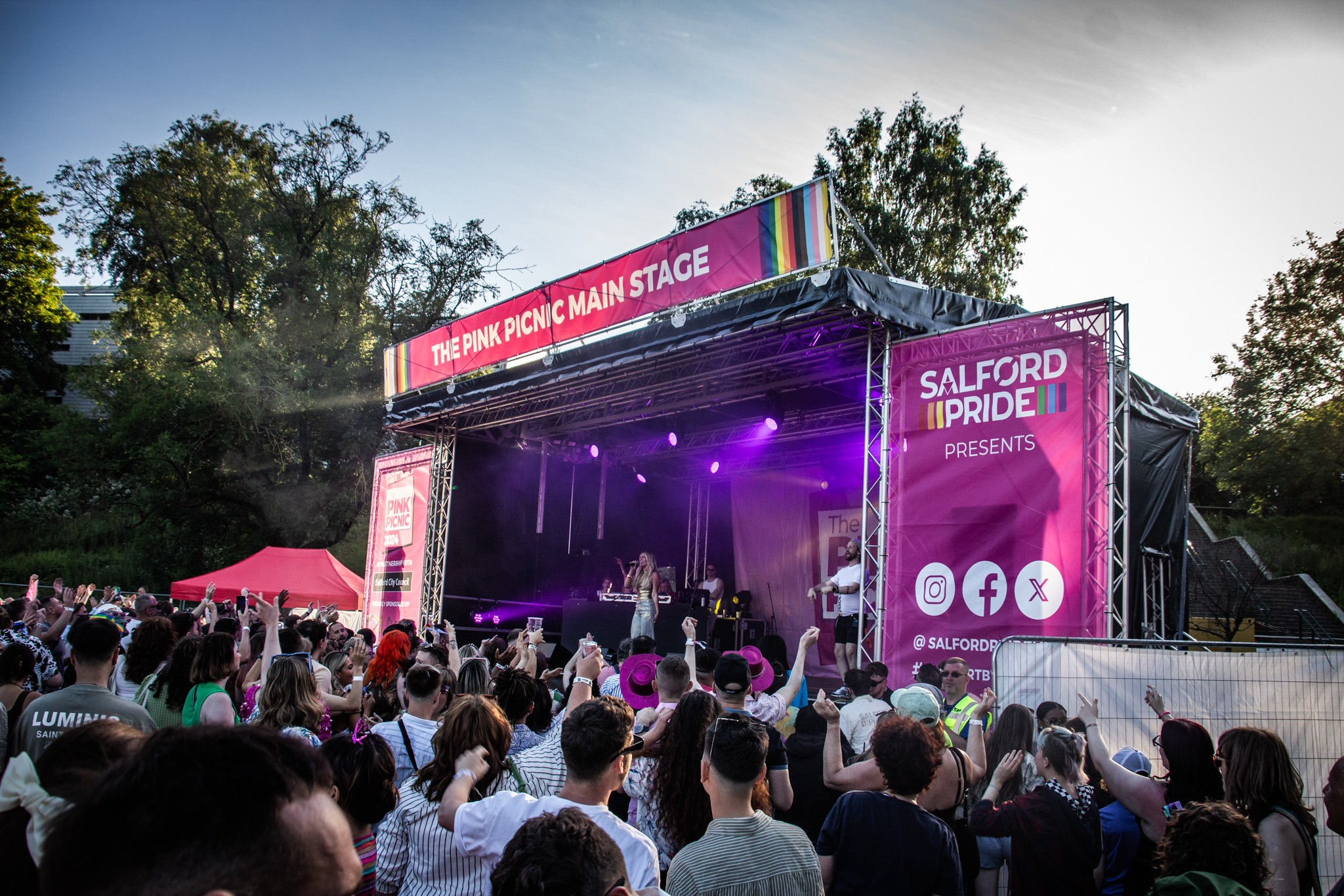 A crowd stood in front of a stage