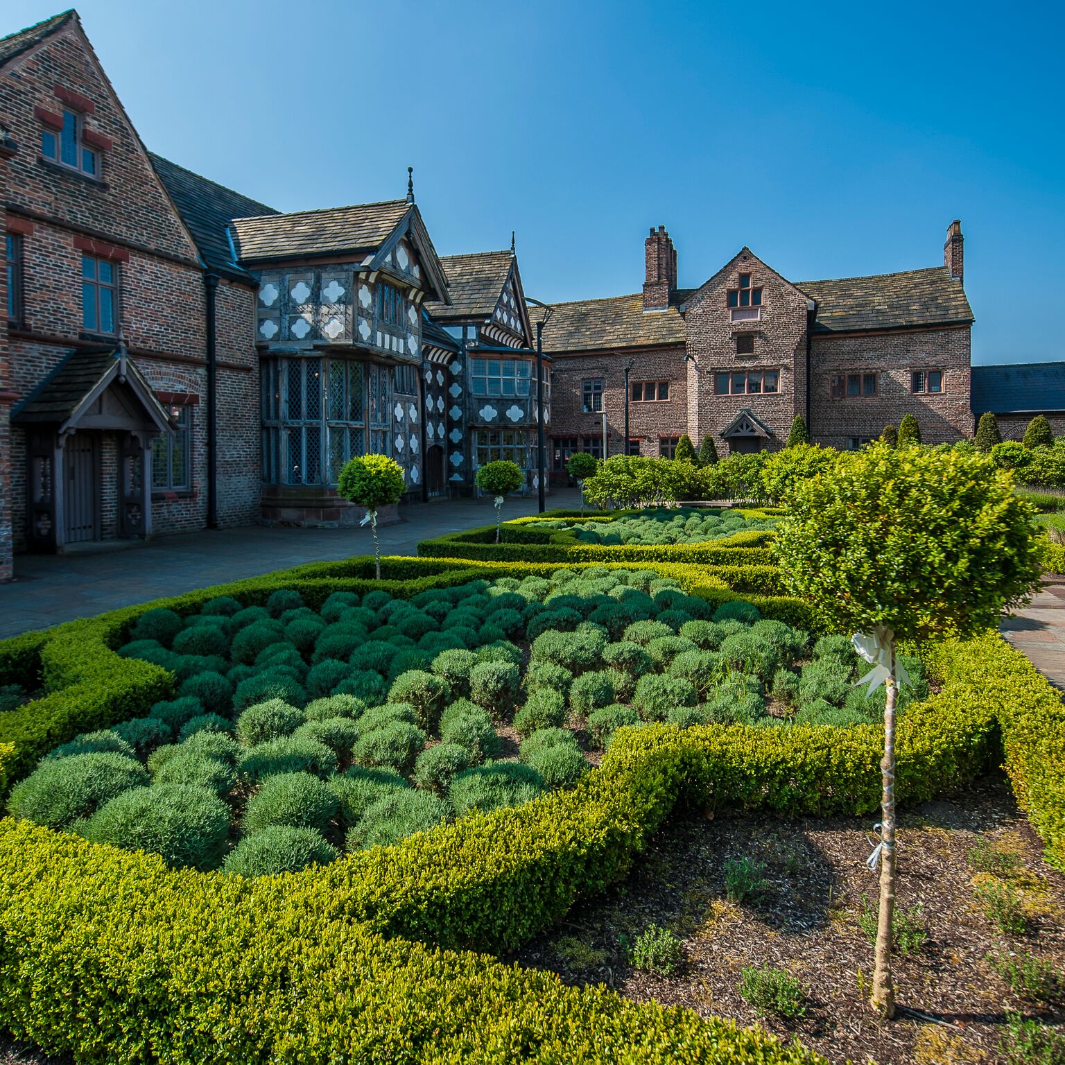 The exterior of Ordsall Hall and gardens