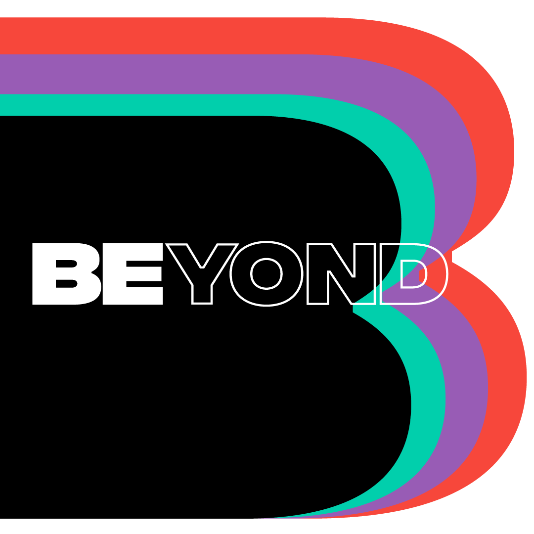 Initial B in red, purple, green, black. Words Beyond written over the top
